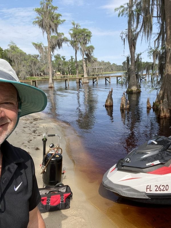 Jet ski at a lakeside dock in Central Florida serviced by Makin Waves